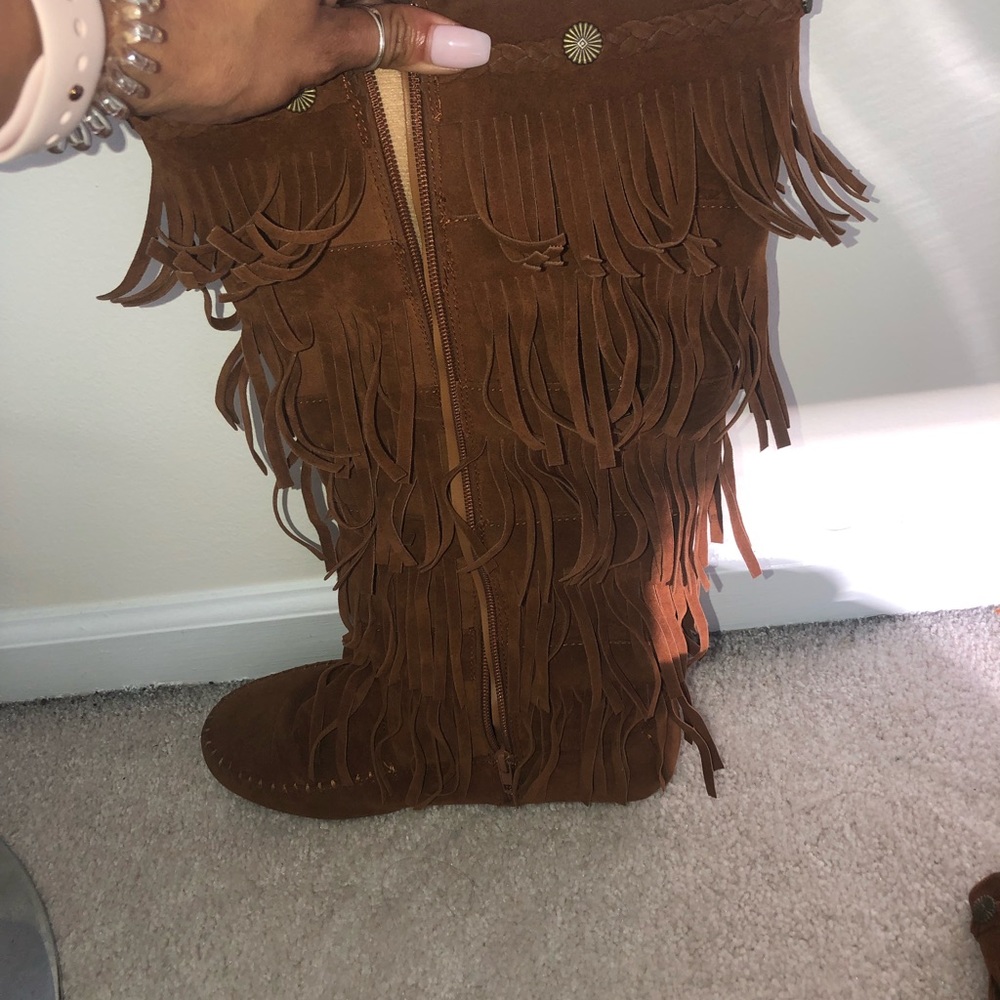 Zip up moccasins.
